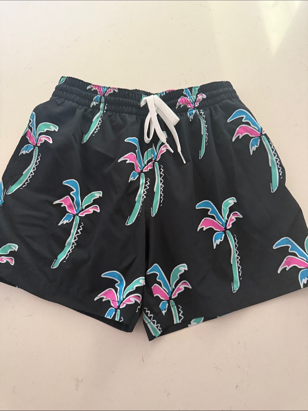 chubbies Black Swim Trunks with Teal and Pink Palm Print. Xs, 5.5” lined/shorts
